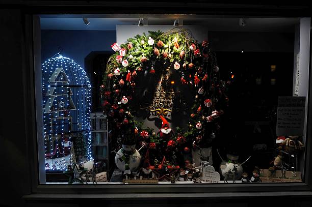 istock christmas display in a window in the evening 2250750866