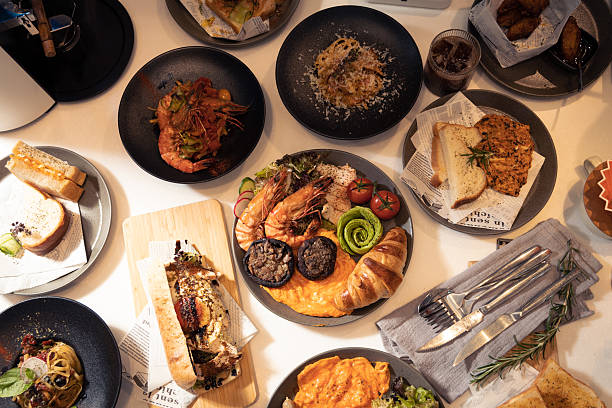 istock gourmet brunch table with shrimp pasta sandwich variety 2250751427