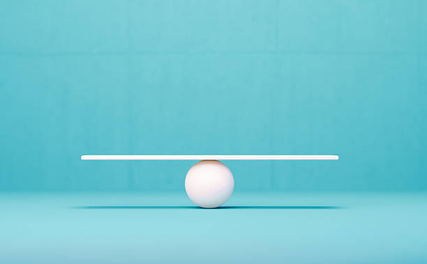 istock White Seesaw Before Blue Background - Balance Concept 2250755018