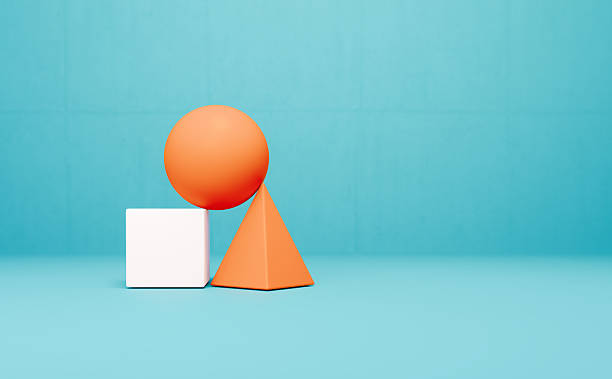 White and orange colored geometric objects before blue background. Horizontal composition. Balance and harmony concept.