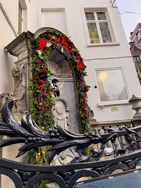 istock Manneken Pis statue in Brussels decorated with Christmas 2250757071
