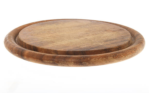 istock Dark Wooden Cutting Board Isolated on White Background 2250759269
