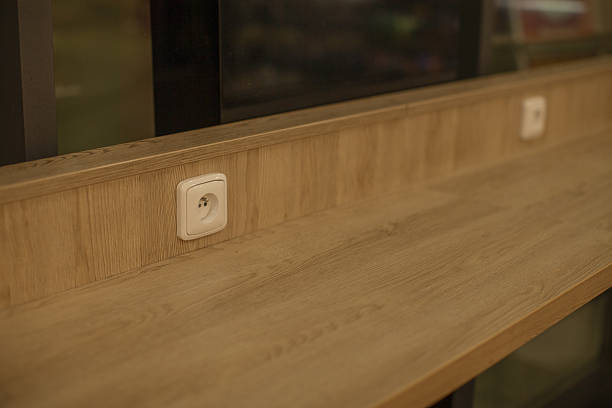 Laminated oak surface with subtle neutral hues and warm glow