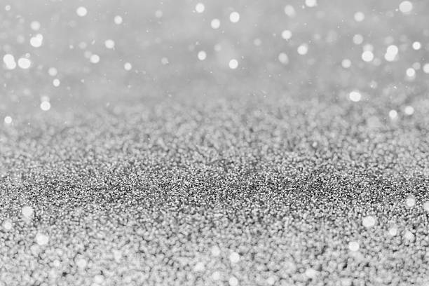 istock Shimmering silver glitter texture with bokeh lights for background and design projects 2250760159