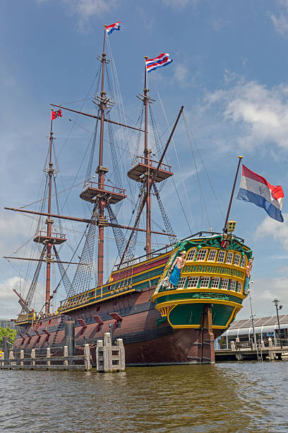 Amsterdam, Netherlands - May 17, 2018: Replica VOC Ship From 1749 Nautical Exhibition in Front of Maritime Museum at Kattenburgerplein Sunny Spring Day.