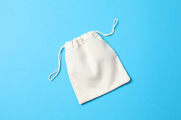 istock Small eco sack on color background. Top view. 2250765342