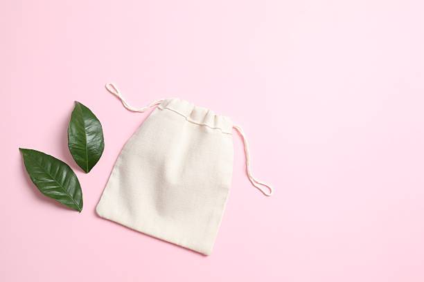 istock Small eco sack on color background. Top view. 2250765409