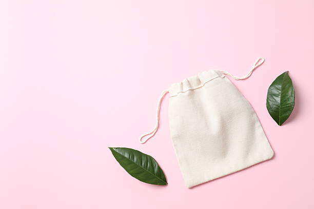 istock Small eco sack on color background. Top view. 2250765421
