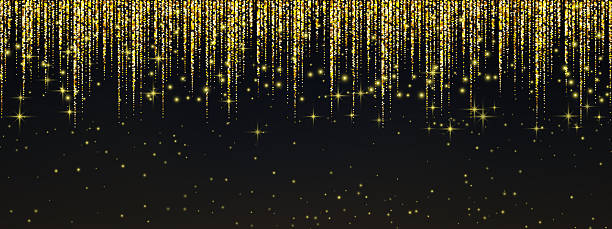 istock Golden glitter rain cascading against black background with shimmering stars and magical light particles creating luxurious festive atmosphere for celebrations. 2250765720