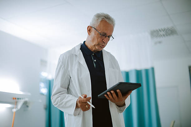 istock experienced doctor checking medical data analysis on a tablet 2250766066