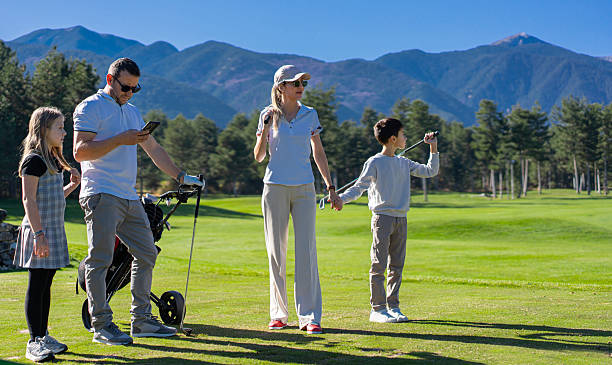 istock Family playing golf on course with mountain views 2250767067