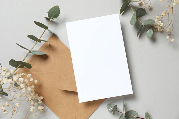 istock Greeting card mockup with eucalyptus branch. Empty greeting card for text design 2250767556