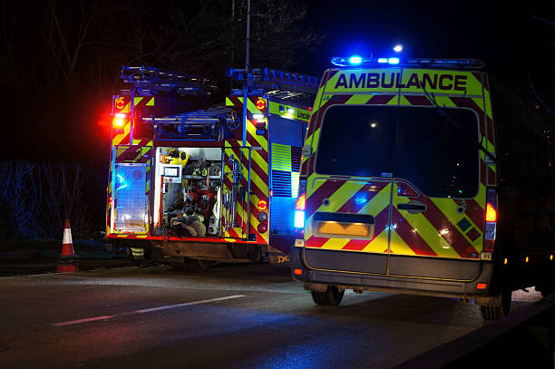 istock accident scene  with ambulance and fire engine on the scene at night 2250768757