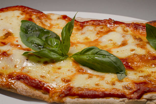 Delicious Margherita Pizza, Authentic thincrust pizza with basil