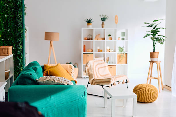 istock Cozy living room interior featuring plants and bohemian decor 2250779143