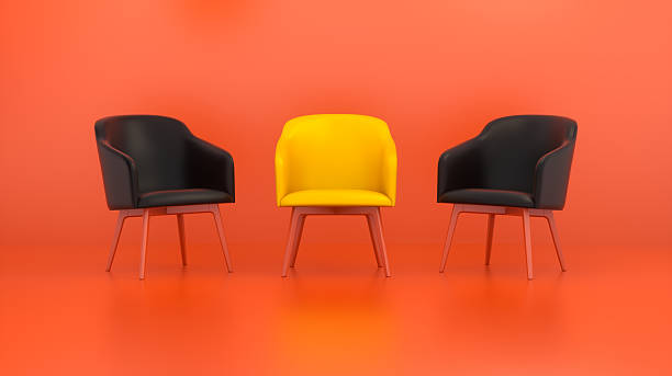 istock Three Modern Chairs on Orange Background, Yellow Chair in the Center, 3D Render 2250781678