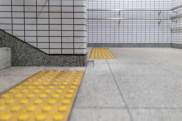 istock Tactile Paving and Staircase in a Modern Underground Passage 2250781784