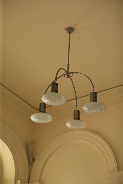 istock Intricate ceiling light arrangement with reflectors and soft glow illumination 2250784996