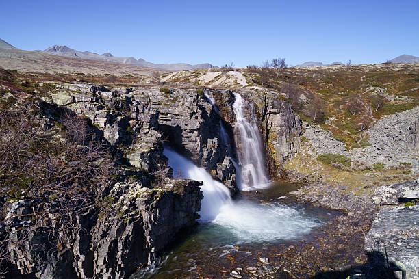 istock Scenic canyon waterfall with Norwegian mountain backdrop 2250793491