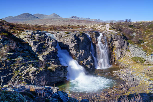 istock Scenic canyon waterfall with Norwegian mountain backdrop 2250793507