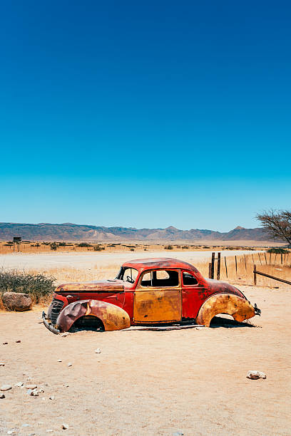 istock Desert Vintage Car Wreck In Namibia 2250795063