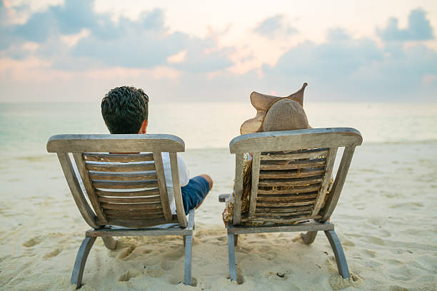 istock Young couple enjoying at sunset on Maldives 2250797923