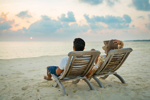istock Young couple enjoying at sunset on Maldives 2250797976
