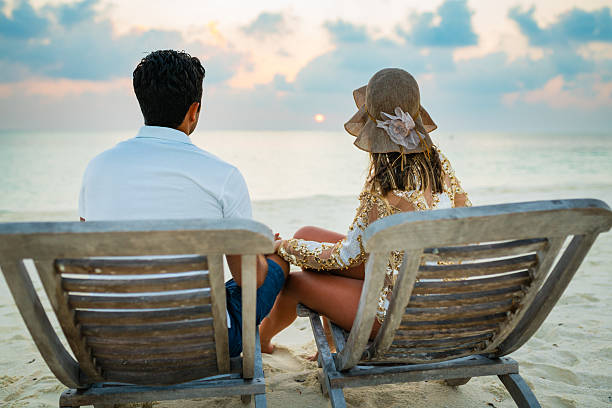 istock Young couple enjoying at sunset on Maldives 2250798027