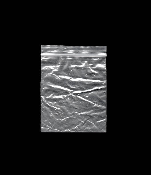 istock Plastic silver textured pouch, compact crinkled packaging sleeve used for storage, labeling and protective purposes. 2250803830