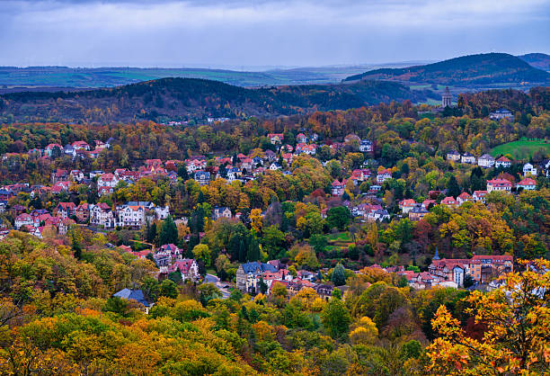 istock Wide angle view of Eisenach town surrounded by autumn forest, Germany 2250807521