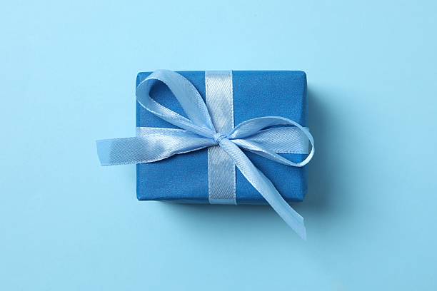 istock Beautiful gift box with festive bow on color background 2250815052