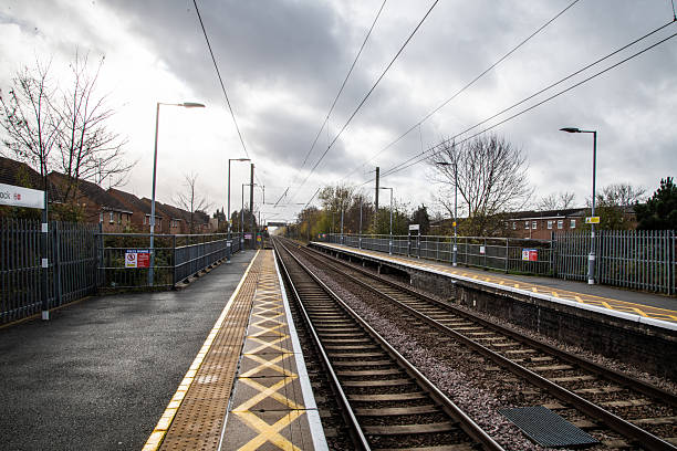 istock Railway Track View from Platform at Enfield Lock Train Station 2250824943