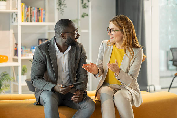 istock Business colleagues having a conversation in modern office 2250833896