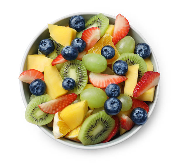 istock Tasty fruit salad in bowl isolated on white, top view 2250836876