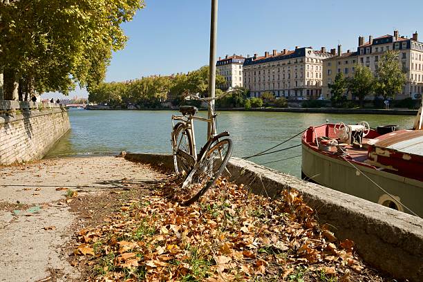 Riverfront with bicycle and house boat