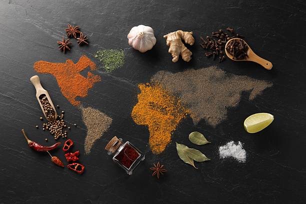 istock World map of different spices and products on dark textured table, flat lay 2250838257