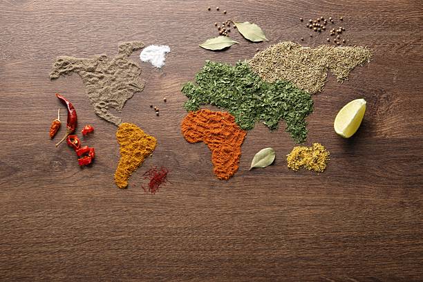 istock World map of different spices on wooden table, flat lay 2250838278
