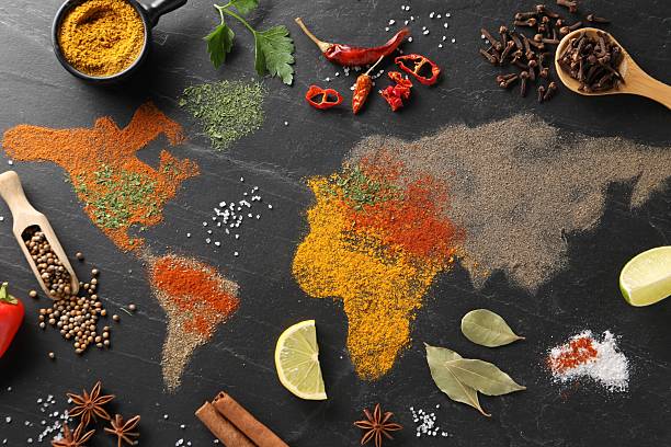 istock World map of different spices and products on dark textured table, flat lay 2250838296
