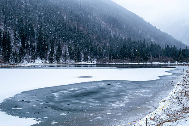 istock Frozen Mountain Lake in Winter 2250839128