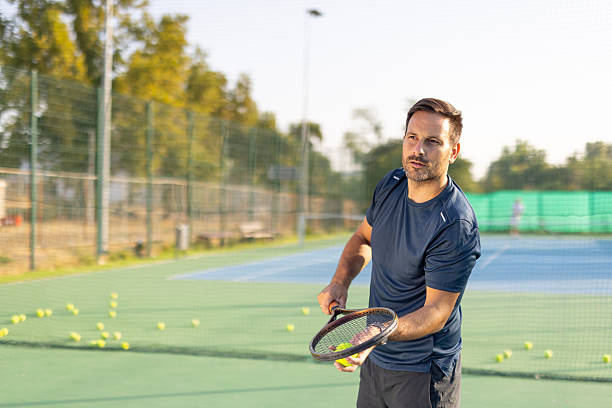istock Focused athlete holds racket ready to deliver powerful backhand 2250840401