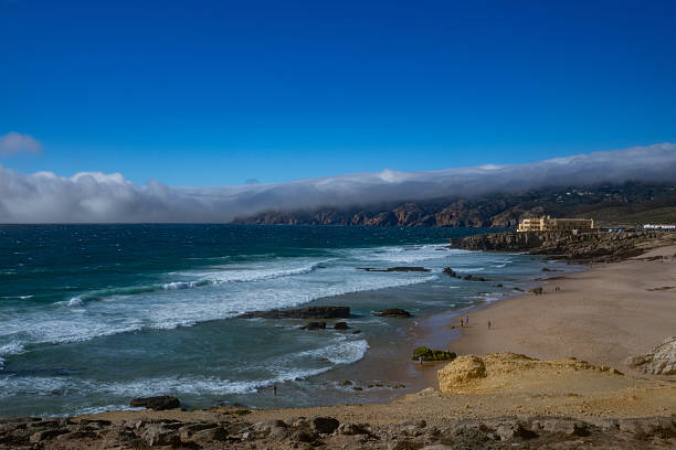 View of the scenic Guincho Beach (Praia do Guincho), in the sea, near Cascais, in Portugal