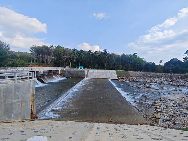 istock Khlong Wang Heep 1 Weir (Kuan Than) is a spillway with a pleasant atmosphere, perfect for relaxing. 2250843507