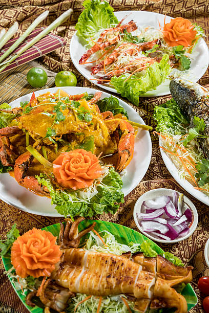 istock thai seafood platter with squid crab prawn and fish garnish 2250848729