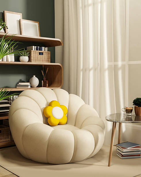 istock White sofa and flower cushion with coffee table on carpet floor aside bookshelf and window curtain. 2250848925
