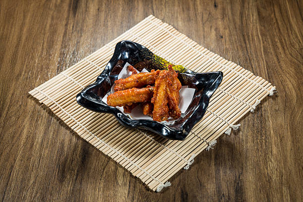 istock spicy glazed chicken wings with seasoning garnish 2250848981