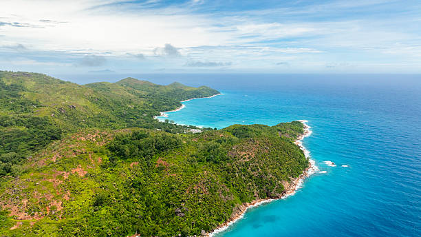 istock Lush green hills and secluded turquoise bays. Praslin, Seychelles. 2250852467