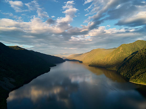 istock Calm Bled lake at sunrise with clouds in a sky. 2250854980
