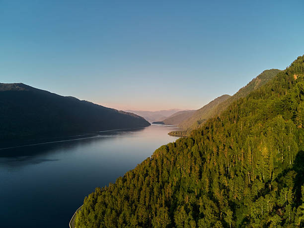 istock Calm Bled lake at sunrise with clouds in a sky. 2250858396