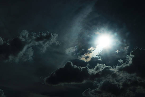 The sun breaks through the dark clouds during the day