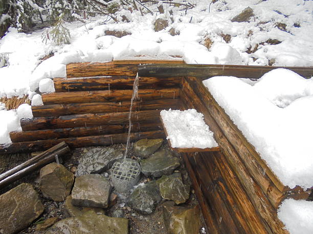 istock Sulphuric spring in Czech mountains during snowy winter 2250873451